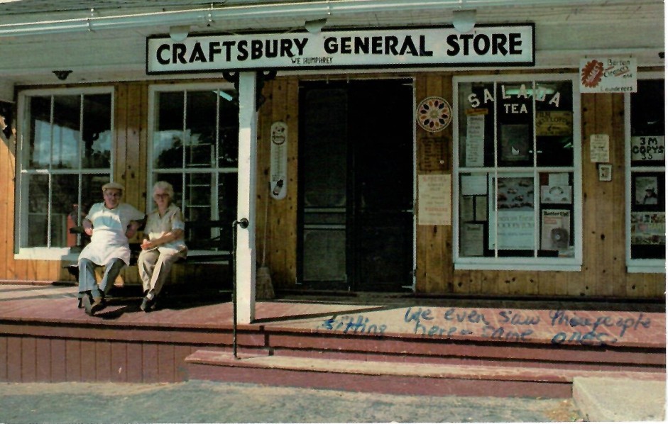 couple sitting outside of craftsbury general store
